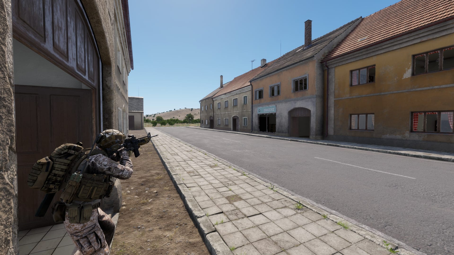 15th MEU Marine advancing on a village patrol